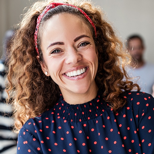 Woman sharing beautiful smile after cosmetic periodontics