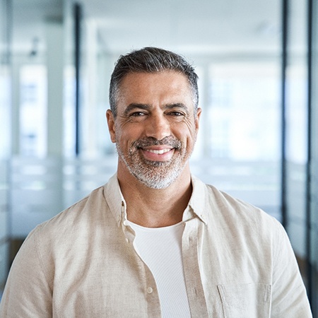 Closeup of man smiling in office