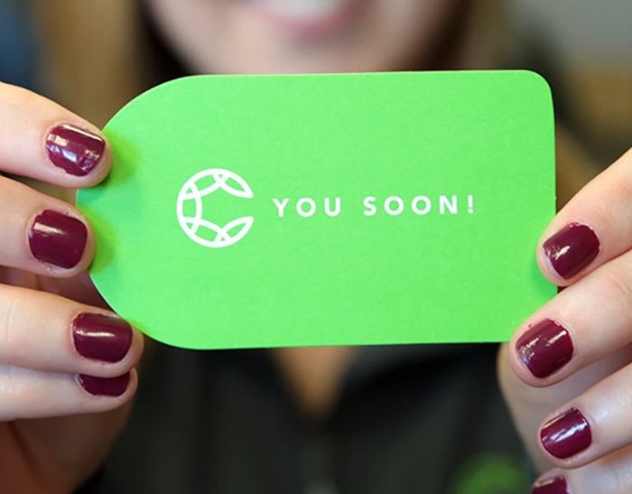 Green index card that says see you soon