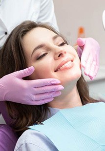 woman smiling while visiting periodontist near Springhurst