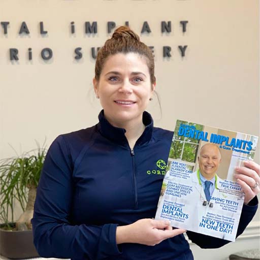 woman holding magazine