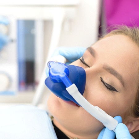 Woman visiting a sedation dentist in Louisville