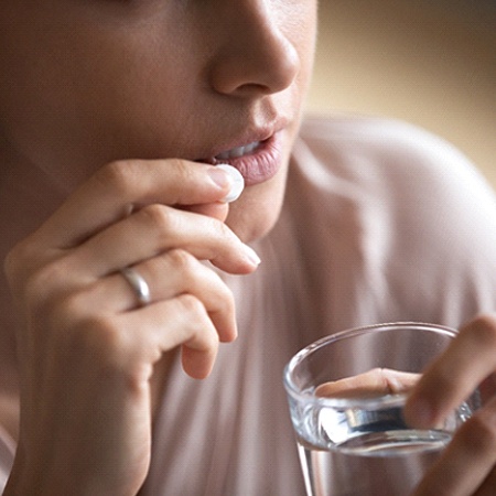 Woman using sedation dentistry in Louisville