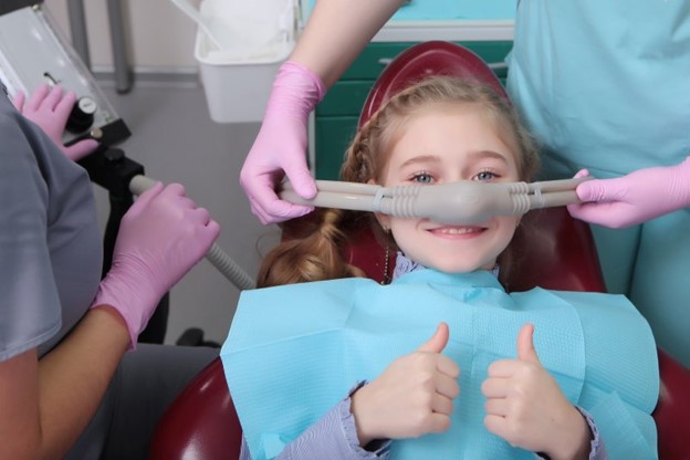 Young girl about to receive sedation dentistry.