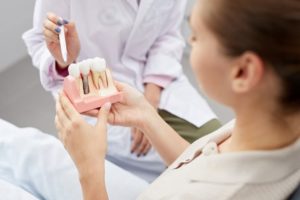 Patient visiting their dentist for a dental implant consultation